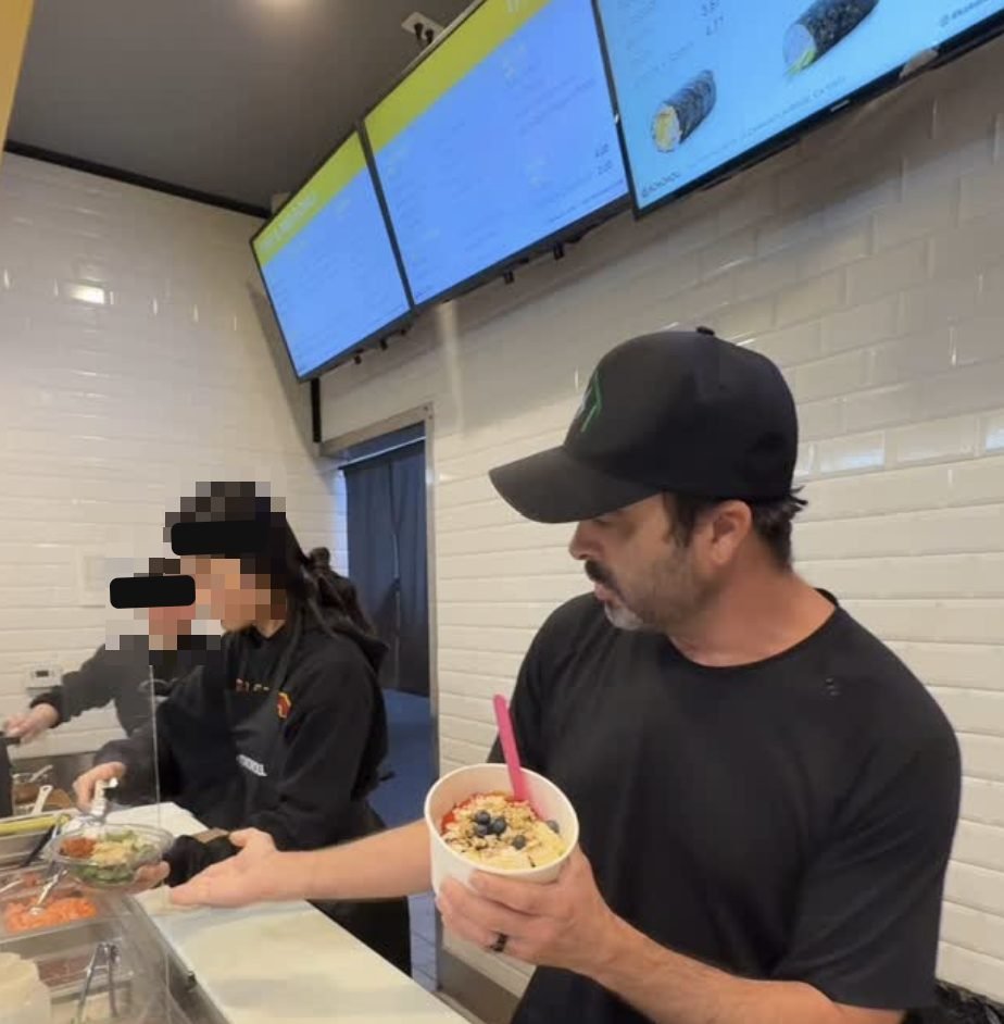 Chris on the line at Kokoroll Sushi with two of the team
